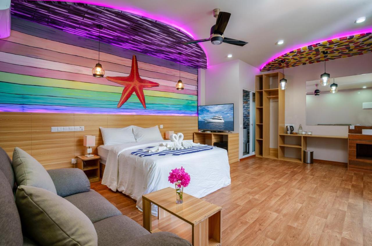 Ukulhas Villa Beach Hotel Bagian luar foto